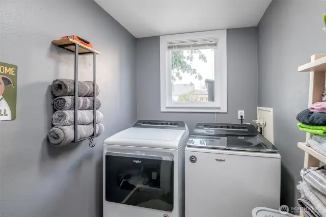 Beautiful light in this laundry space makes laundry a little easier.