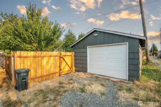 The detached garage has ally access and a gate to the backyard too.