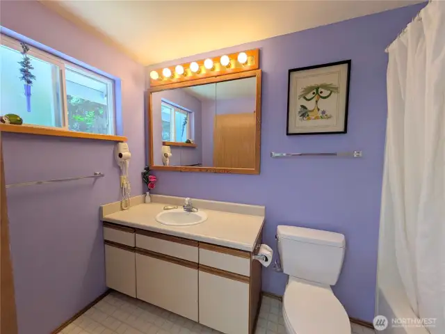 The primary bathroom is in excellent condition.