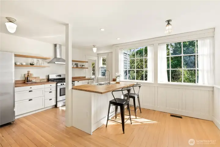 Updated Kitchen.  Stunning original windows & lighting.