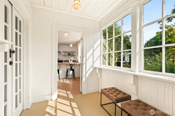 Back sunroom and entrance to the Coach House: There are 2 apartments here.