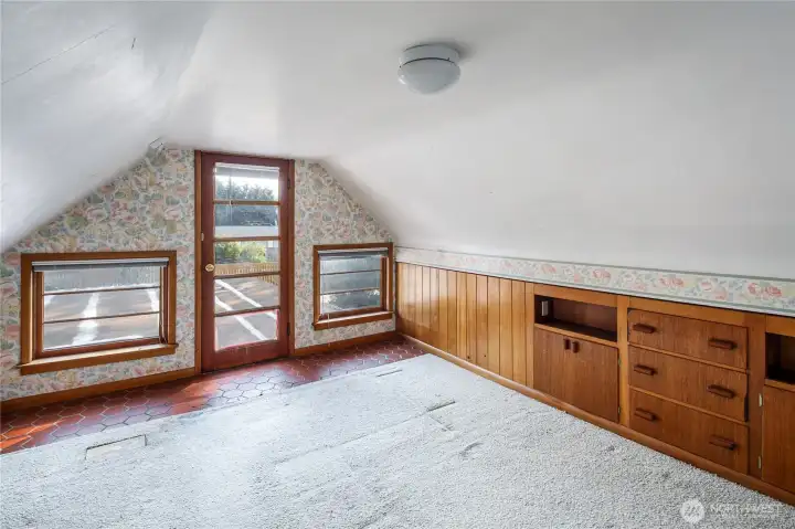 Primary bedroom with rooftop deck access