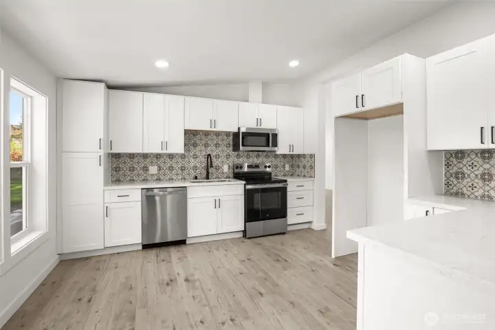 New Kitchen, white cabinets, tile backsplash