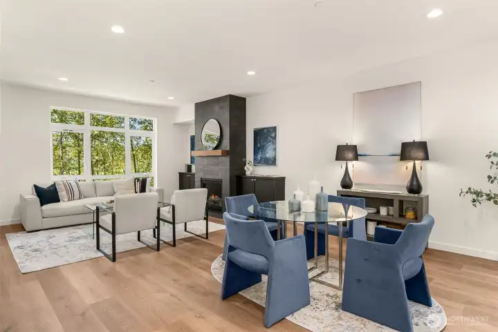Statement fireplace connecting the dining and living rooms