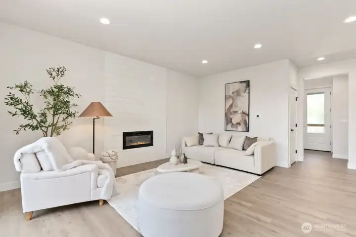 Interior photo shown is from a similar new construction home by the same builder. Fixtures, flooring, floor plan, and finishes are representative and may differ from the home currently under construction.
