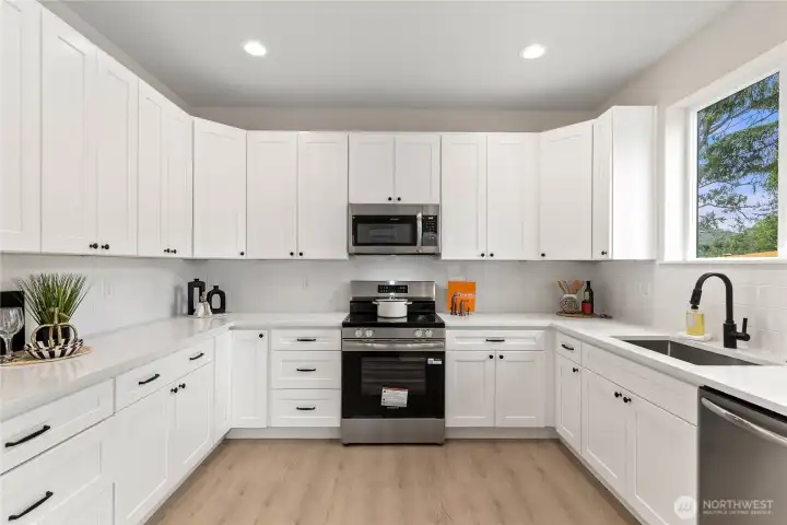 Photo is of similar home next door with identical floor plan Photo is of similar home next door with identical floor plan