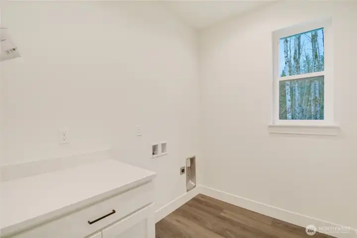 Laundry, Prior Build of this Floorplan, Finishes will vary from Photos