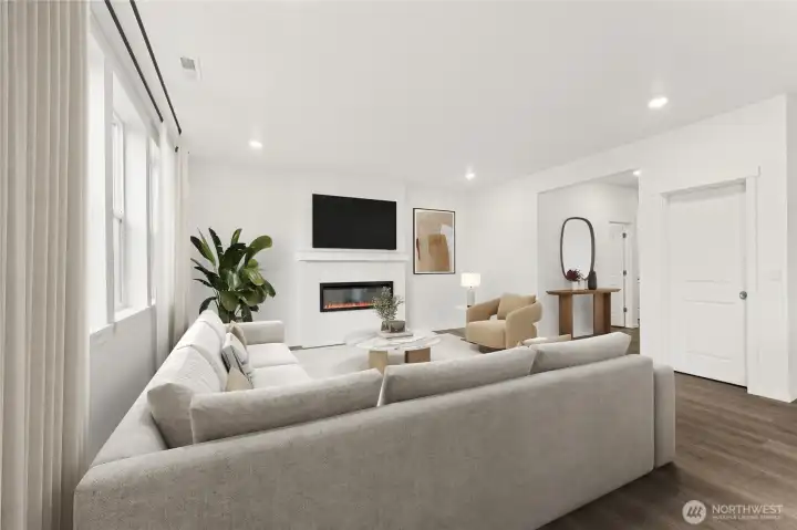 Electric fireplace to cozy up to with a good book. Virtually Staged.