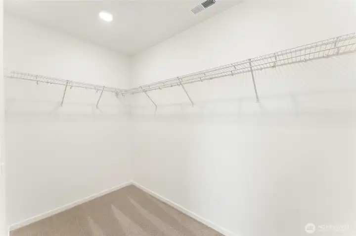 Large primary closet for all your clothes & shoes.