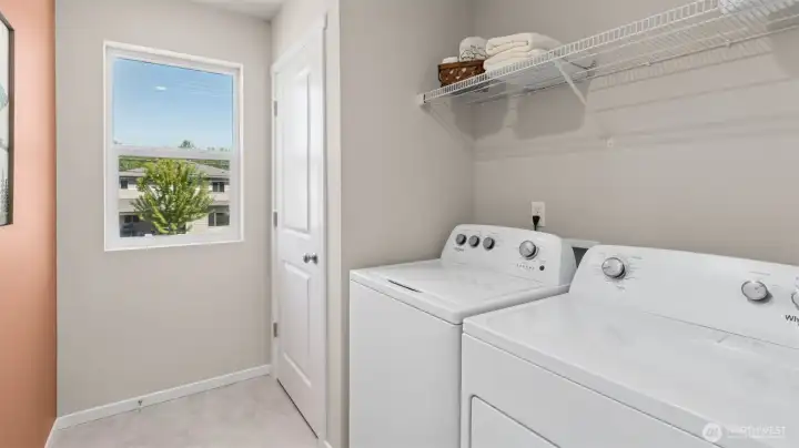 Laundry room with window for that special touch. Virtually Staged.