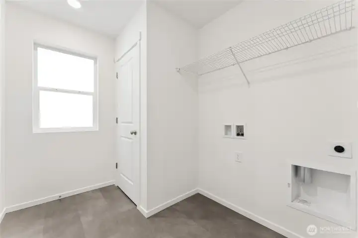 Laundry room with window for that special touch.
