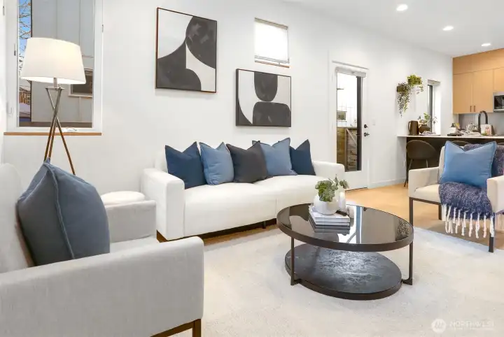 Spacious living area, engineered hardwood floors, open concept for easy entertaining.