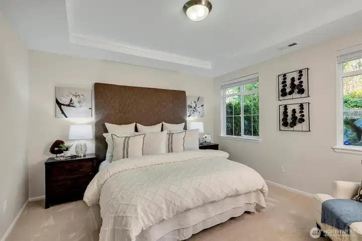 This photo is deceptive...the room is much larger than it seems. There's about 10" on each side of the end tables on either side.