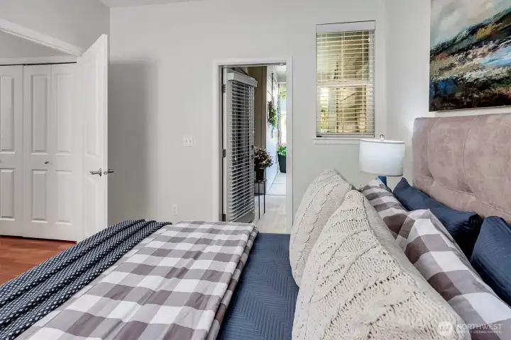 Door to the front entry, a few feet from the hallway bathroom with tub and shower, and a large closet. Great flex space for office, guest, or hobbies...or a combination of all three.
