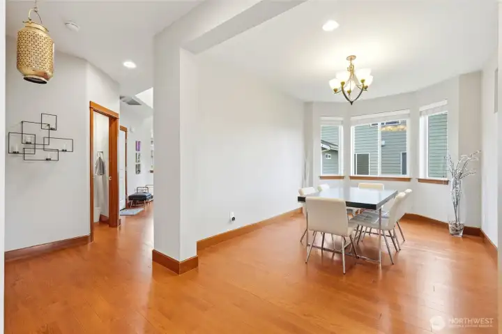 Formal dining plus a versatile bonus room/den/office on the main level