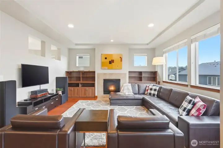 Cozy gas fireplace and built ins in the living room