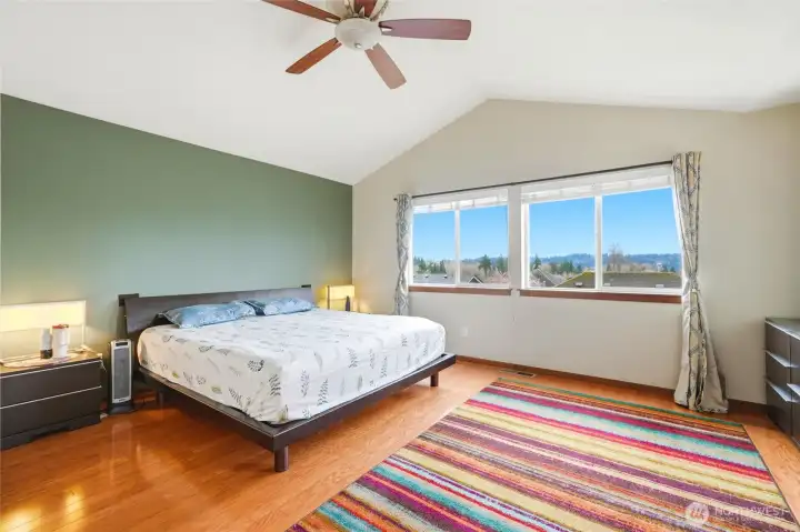 Spacious primary bedroom on the upper level with 5 piece bath and convenient laundry room with 5 piece bath and convenient laundry room