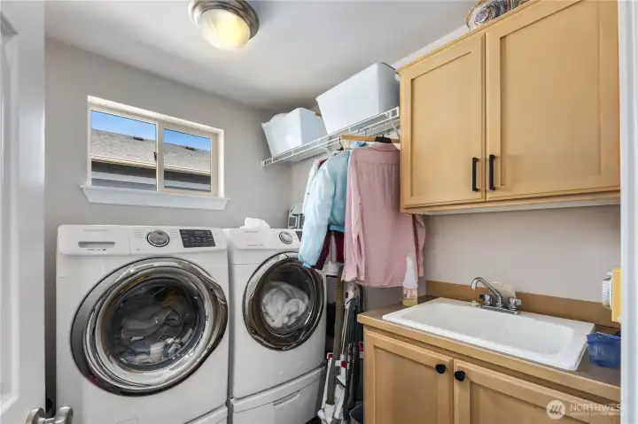 upstairs laundry with beautiful light and utility sink upstairs laundry with beautiful light and utility sink