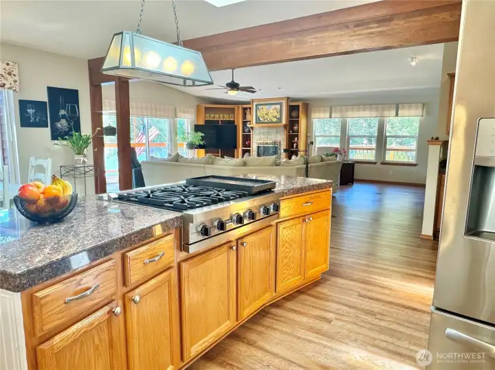 Open kitchen layout keeps everyone connected.