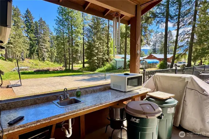 Covered area in the pool house, perfect for meal prep.