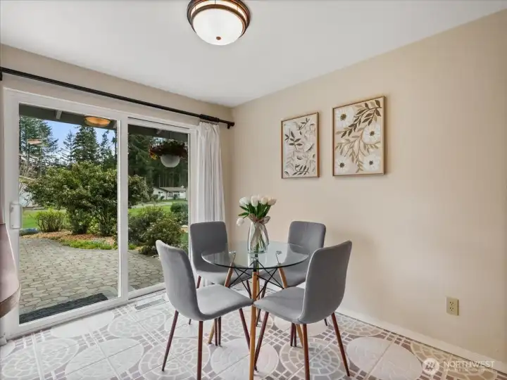 Eating space off the kitchen and access to the beautiful patio.
