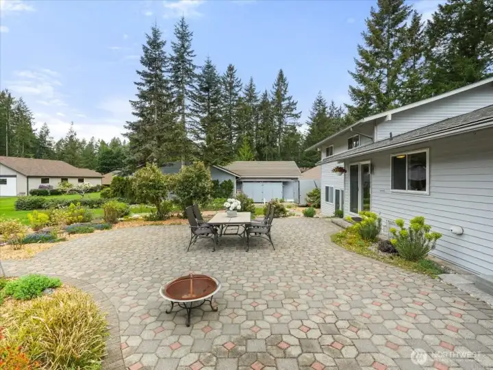 Another angle of the wonderful outdoor living space. Raspberry plants just below.