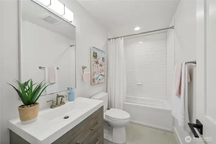 Downstairs full bath. Downstairs full bath.