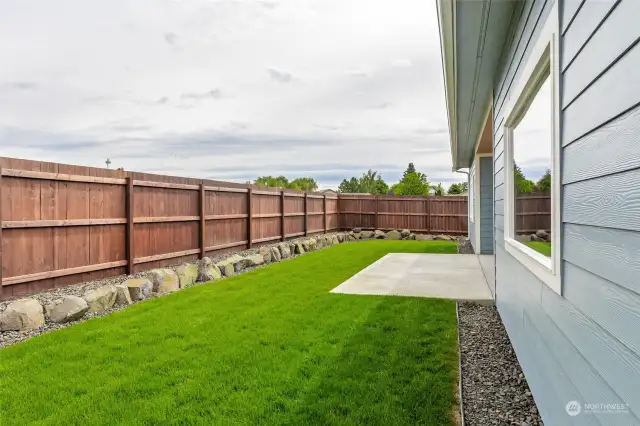 Fully fenced and landscaped yards with patio extension available.