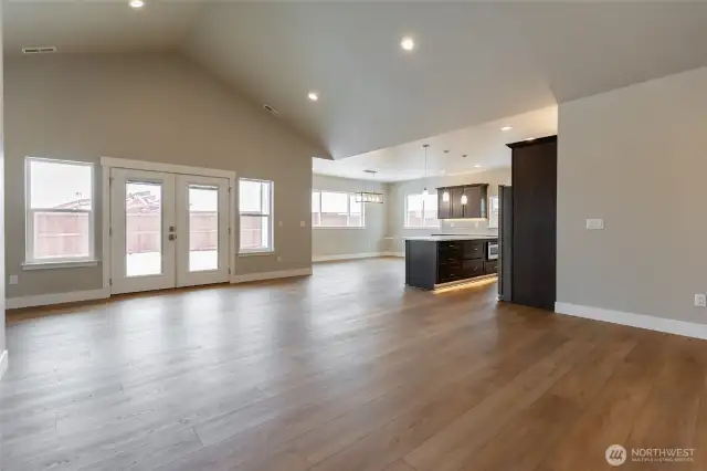 View from living room into dining area and kitchen.