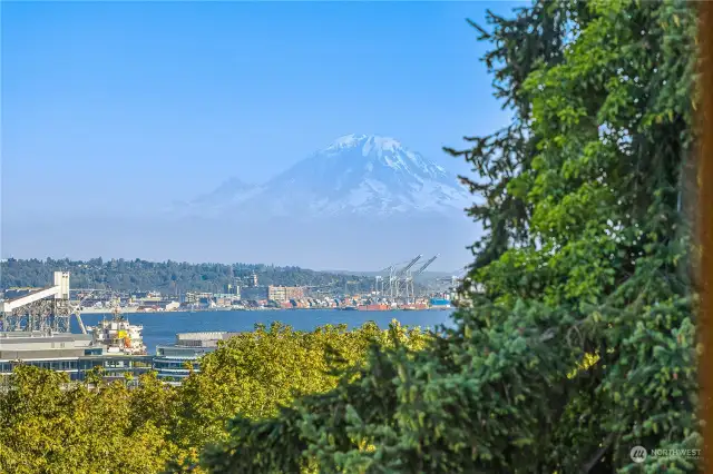 Top floor unit has breathtaking views of Mt. Rainier, Elliott Bay and downtown Seattle