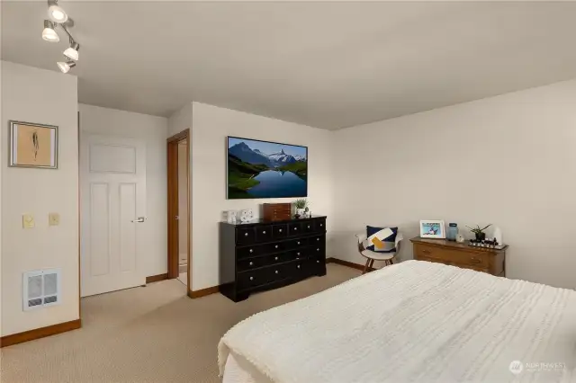 Middle floor unit - Primary Bedroom looking toward bathroom