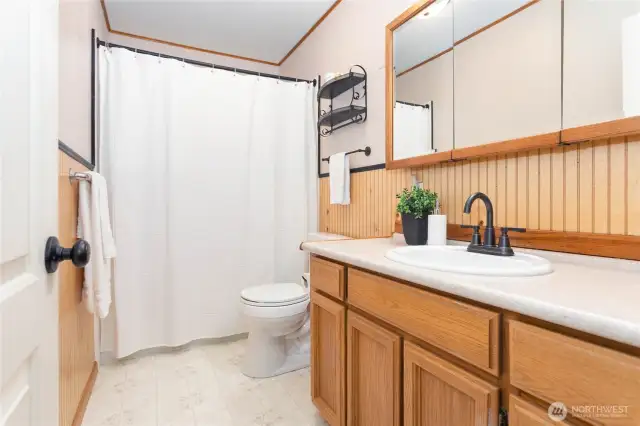 Full bathroom right next to bdrms w/fresh paint & updated fixtures