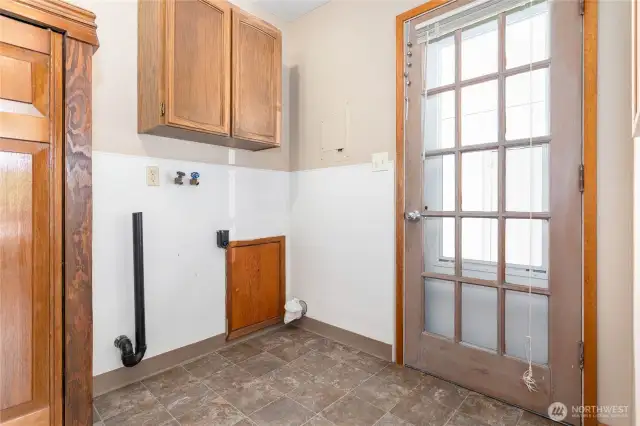Utility room just off kitchen, can enter right off carport