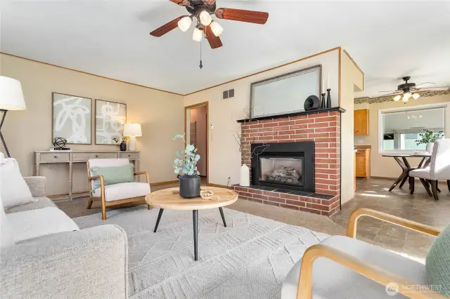 Dining just off kitchen & open to living room; hall to left leads to bedrooms & bathroom