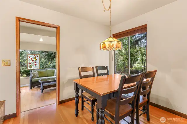From the living room, enter into the sunroom/office/den that could function as a third bedroom for guests.