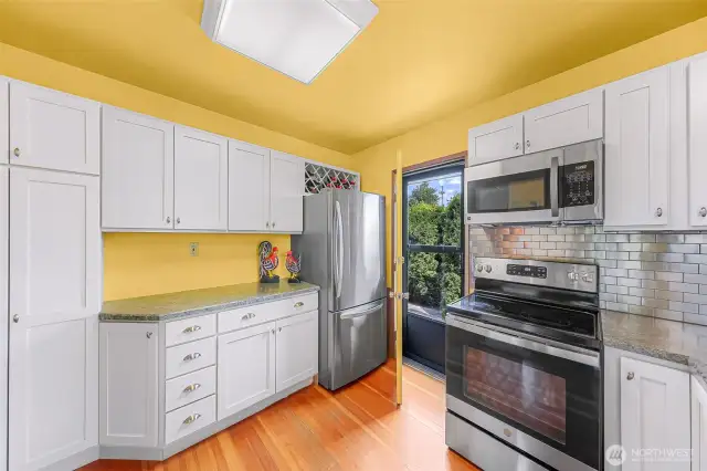 Kitchen has a back door into the patio for good access to bbq and guests.
