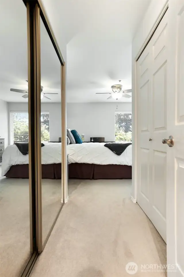 The spacious primary bedroom suite offers ample closet space (both sides of the walk through from bedroom to bath are closets)