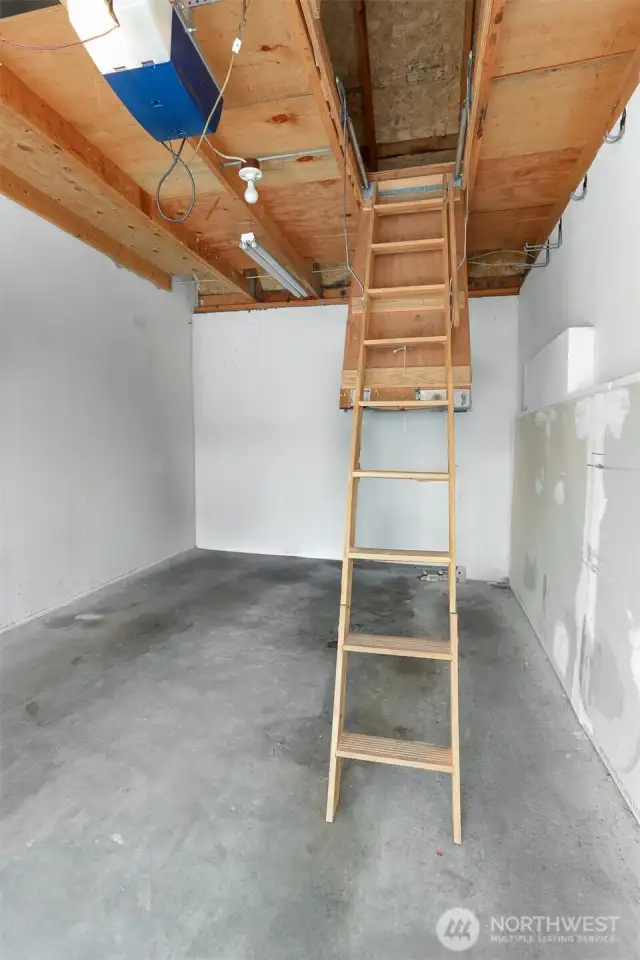Pull that ladder down and you have access to a large loft additional storage space.