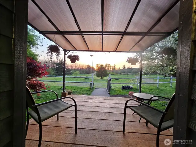 Stunning views from the front porch looking past the circular driveway.