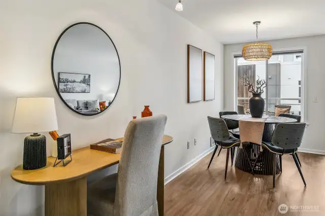 Living room even has space to add additional buffet or desk space.