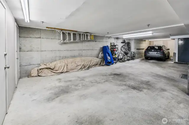 Spacious controlled access parking space, and not pictures; a huge private storage.