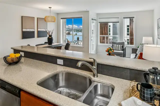 Spacious kitchen is open to the living space- check out the views of the lake!