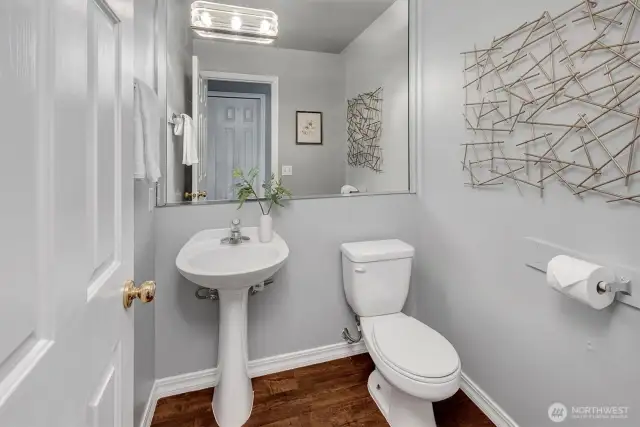 Wall-to-wall mirror enhances space & light.