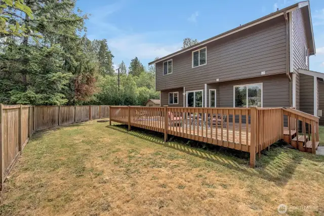 Despite the expansive deck, there’s still tons of room in the backyard for more outdoor fun.