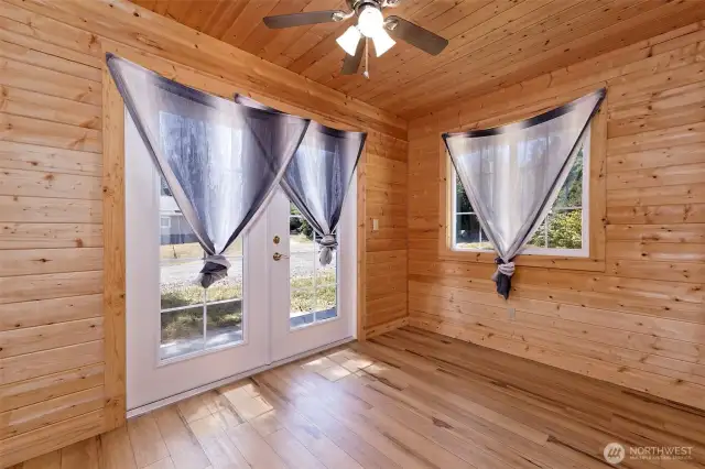What a fun room!  It could be a great home office, art studio, cat room, whatever you need.
