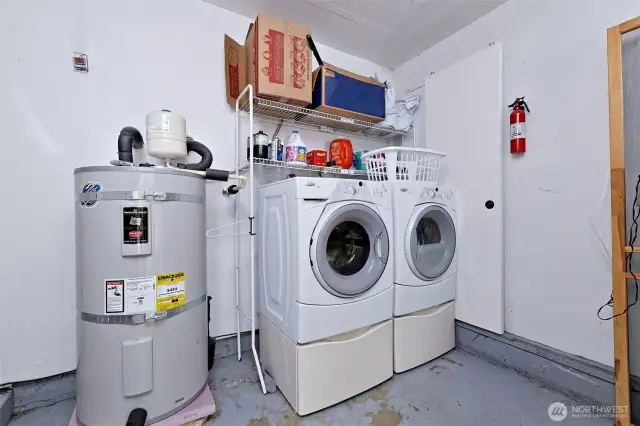 Laundry in the garage, and this nice washer and dryer will STAY!