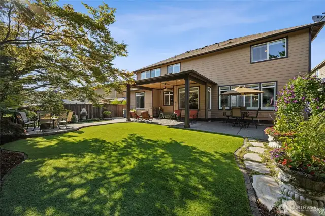 Easy & low maintenance with the lush turf yard.