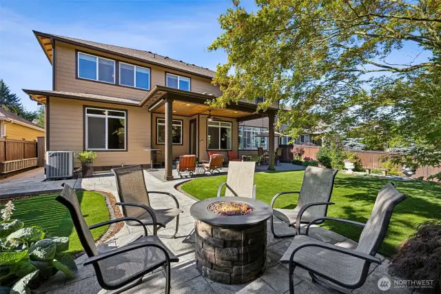 Gather around the built-in fire pit for cozy evenings under the stars—perfect for relaxing or hosting memorable gatherings.