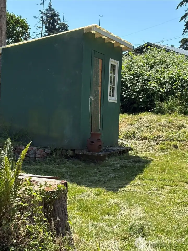 Shed for tools already in place on property. Shed for tools already in place on property.