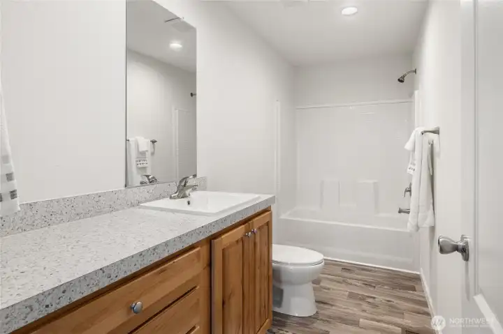 Spacious primary full bathroom.